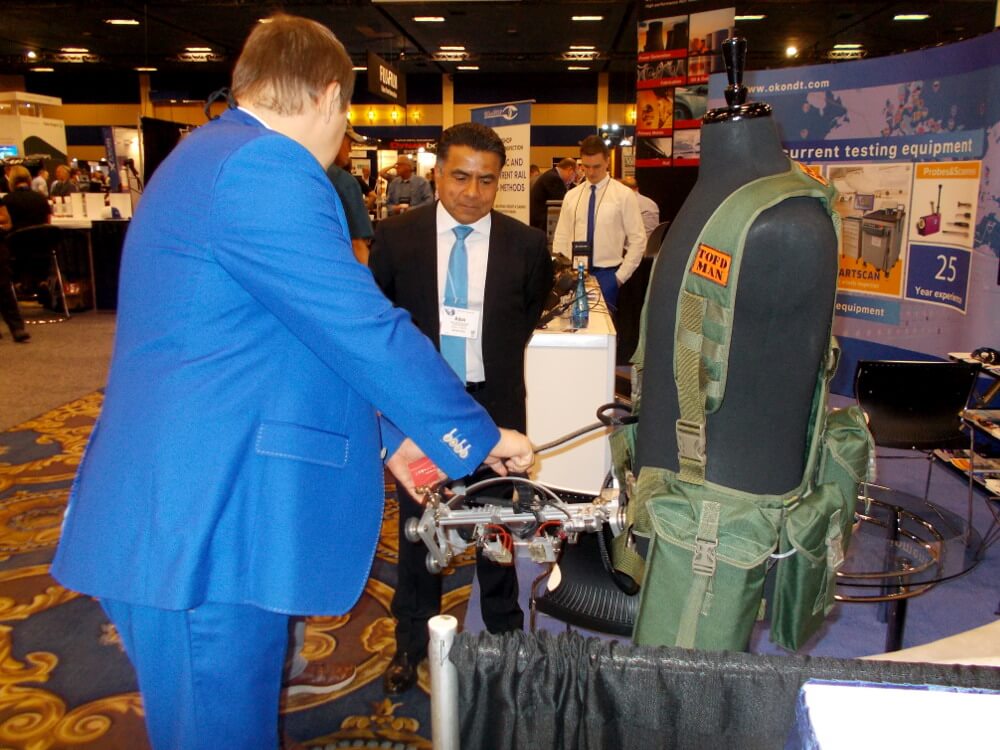 OKOndt GROUP specialist is demonstrating the Wireless Welds Testing System TOFD-Man to the visitors of ASNT Annual Conference-2019