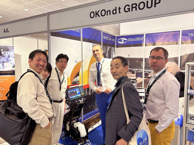 OKOndt GROUP representatives at the company's booth